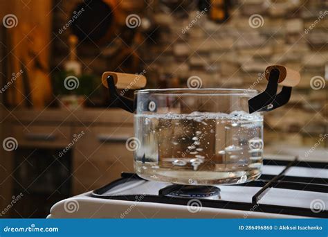 Water Boiling In Glass Pot On Stove Stock Photo Image Of Food