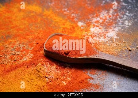 Indian Woman Hand Powdering Indian Spices Coriander Powder In Stone