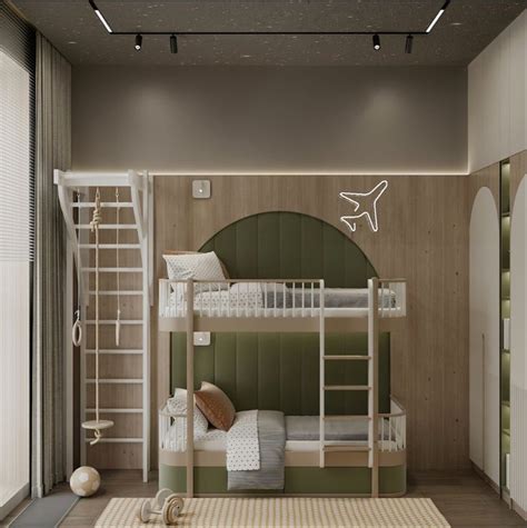 A Bedroom With Bunk Beds And Ladders To The Ceiling Is Decorated In