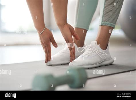 Bend Down And Touch Your Feet Closeup Shot Of An Unrecognisable Woman Stretching To Touch Her