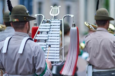 Premium Photo Alpine Band With Bell Lyra Marching During A National