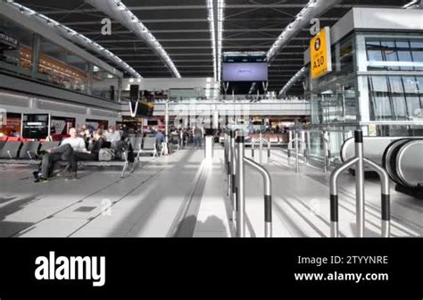 London May 21 2015 People Walking Inside Terminal Of Heathrow