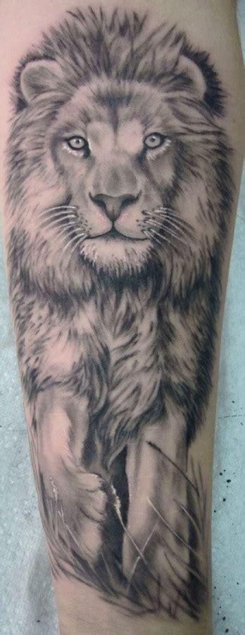 Black and white lion tattoo