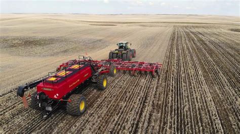 Claas Xerion Pulling A Vaderstad Seed Hawk Youtube