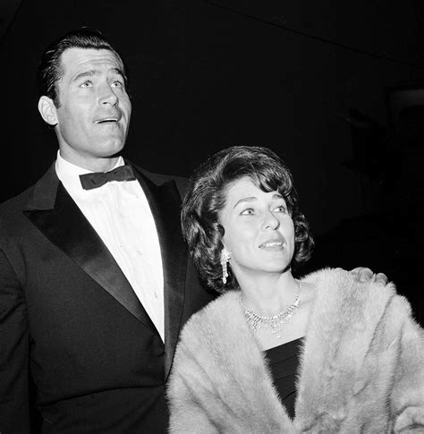 Actor Clint Walker and his wife arrive for the premiere of “Cleopatra ...