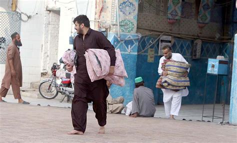 People Volunteering And Preparing Spot For Itikaf In The Holy Month Of