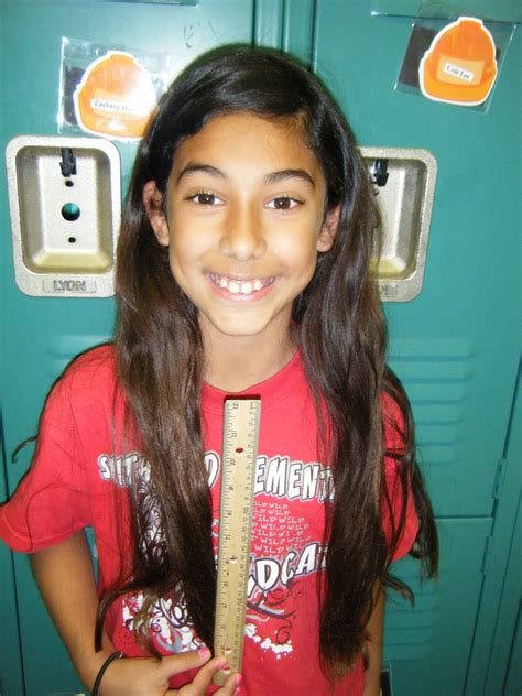 The Tellez Team Blog: ANGELINA DONATES 14 INCHES OF HAIR TO LOCKS OF LOVE