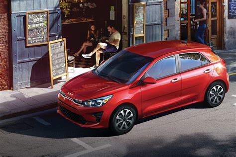 kia rio review pricing  specs