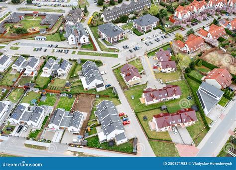 Aerial View Of A Densely Built Up Residential Area With Detached Houses