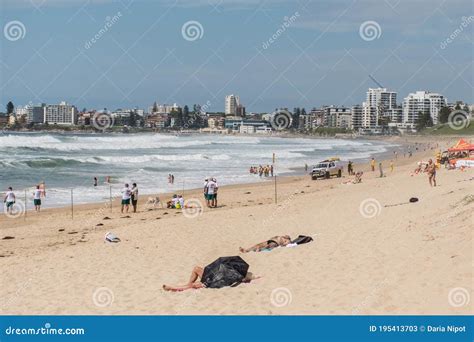 People Sunbathing And Swimming On Wanda Beach Cronulla On Summer Day