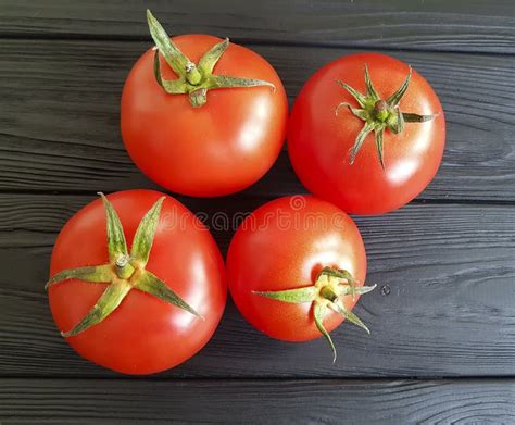 Fresh Natural Tomatoes On A Black Wooden Antioxidant Ingredient