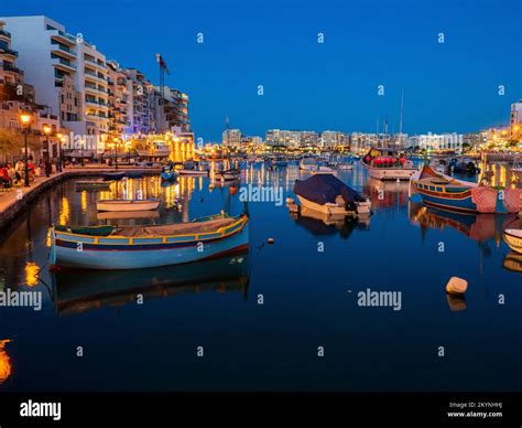 St Julian Malta May 2021 Spinola Bay With Plenty Of Colorful Boats