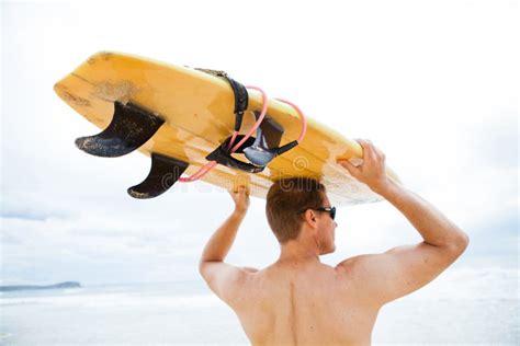 Man Resting Surfboard On Head At Beach Stock Image Image Of Peace