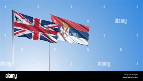 United Kingdom flag and Serbia flag, with blue sky Stock Photo - Alamy