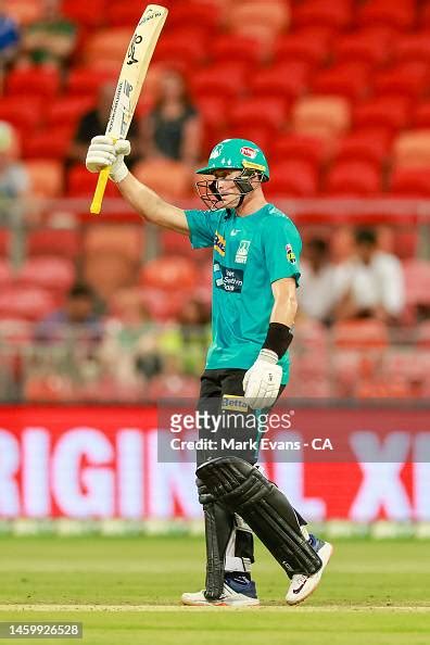 Marnus Labuschagne Of The Heat Raises His Bat After Reaching A Half