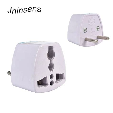 New Universal Travel Adapter Electric Plugs Sockets Converter AU UK US