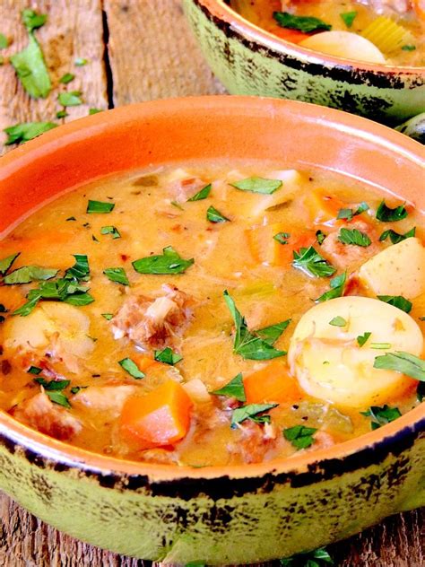 Hearty Pork Stew Has Tender Chucks Of Pork Carrots And Potatoes All Enveloped In A Rich White