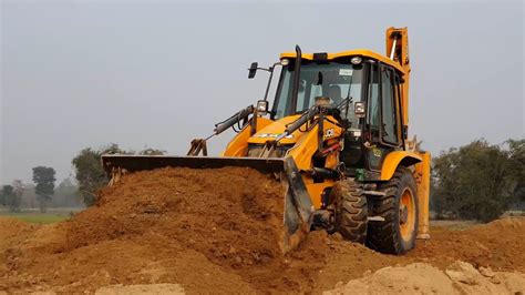 Jcb Pushing Soil And Leveling Road Jcb Earth Movers Making Road