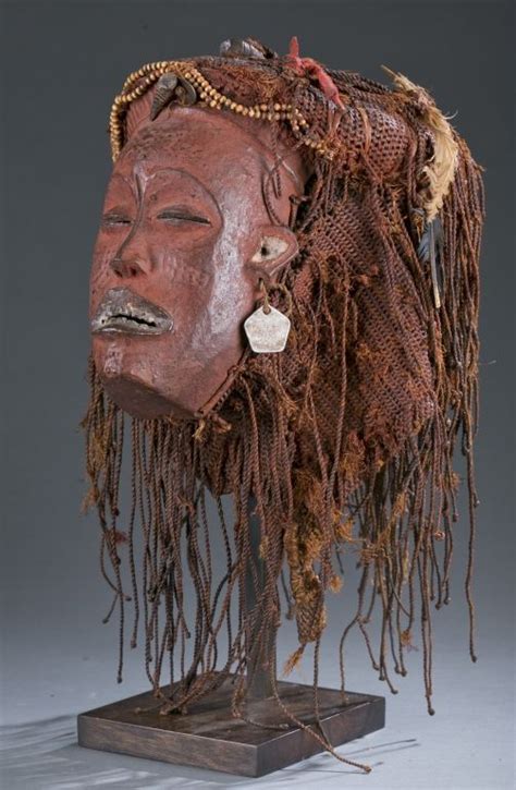 A Female Pwo Mask With Elaborate Fiber Coiffure Democratic Republic Of The Congo Chokwe 20th