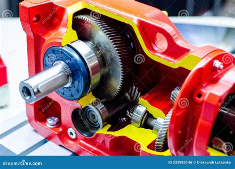 Close Up Of Cross Section Helical Gearbox With Motor Stock Photo