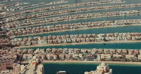 Aerial view of Dubai Palm Jumeirah island, Buildings Stock Footage ft ...