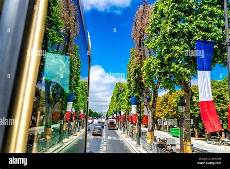 The Champs Elysees From A Tour Bus Heading Toward The Arc De Triomphe