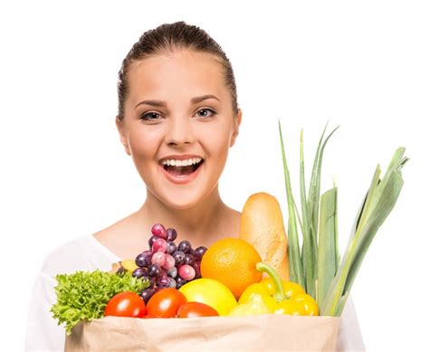 Premium Photo Cheerful Woman Holding Shopping Bag Full Of Fresh Food