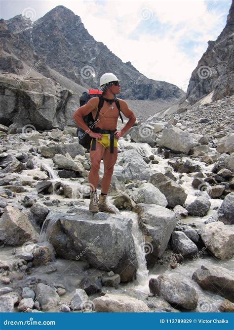 Athletic Naked Climber With A Large Backpack Stock Image Image Of