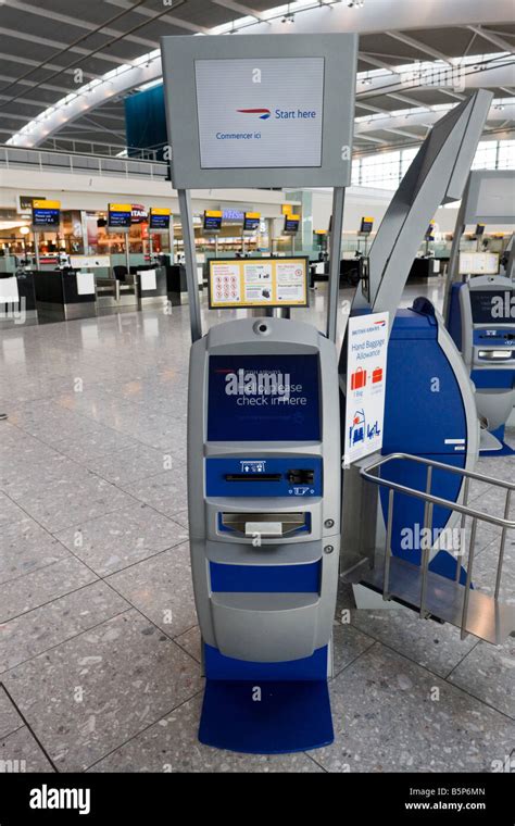 self check in machine, departure level, Terminal 5, Heathrow, London, England Stock Photo - Alamy