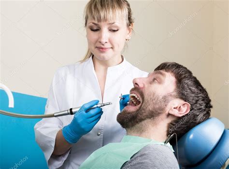 Doctor Examines The Oral Cavity On Tooth Decay Caries Protection