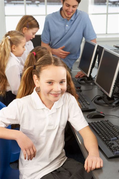 Girls Using Computers In Class With Teacher Stock Image Image Of Adult Confidence 22776211