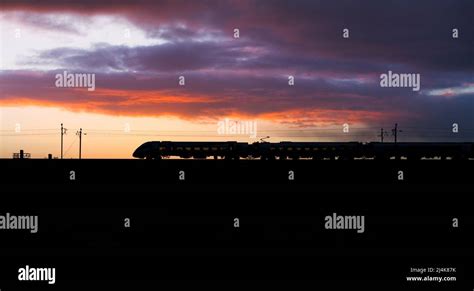 First Transpennine Express CAF class 397 Nova 2 train on the west coast mainline at sunset Stock ...