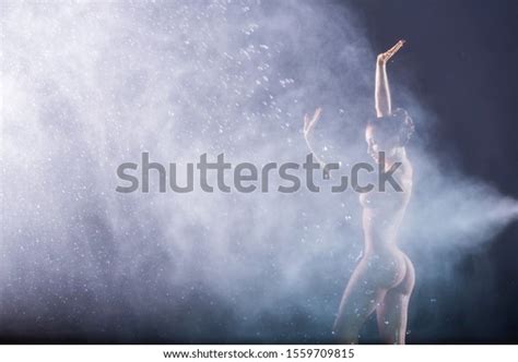 Beautiful European Nude Woman Stands Under Stock Photo