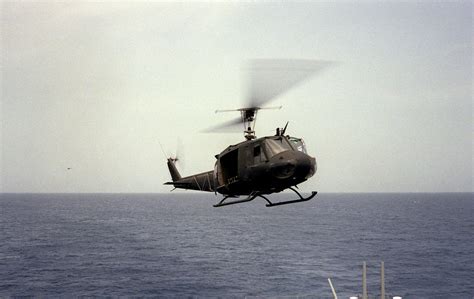 A U S Army UH 1H Iroquois Helicopter Approaches For A Landing Aboard