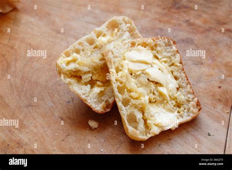 Warm Ciabatta Bread With Butter On Chopping Board Stock Photo Alamy