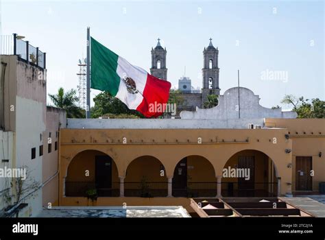 Valladolid Yucatan Mexico Colonial Architecture With Mexican Flag