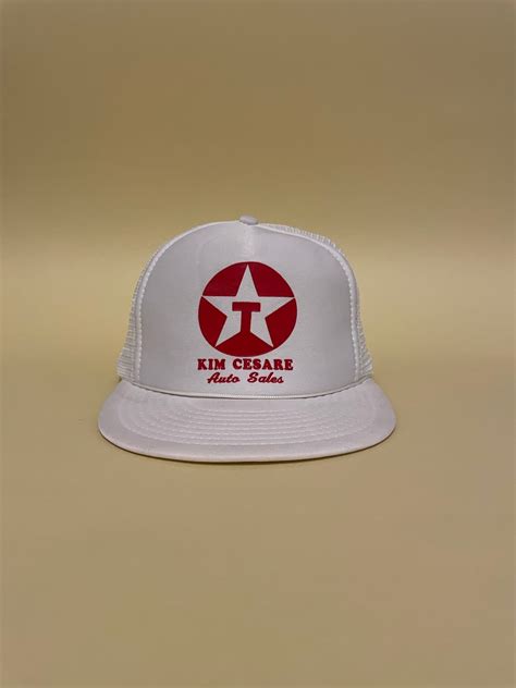 Kim Cesare Cap