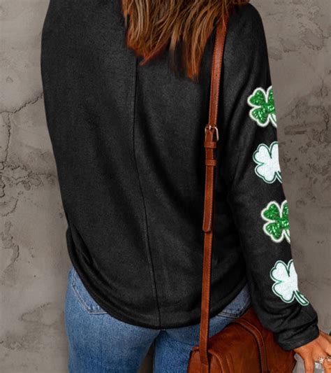 Festive Black St Patrick S Day Long Sleeve Top With Sequin Shamrock