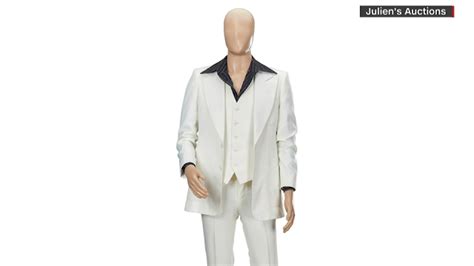 John Travolta's famous 'Saturday Night Fever' suit sold in auction for ...