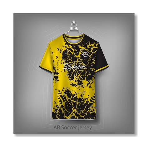 Premium Vector | A yellow and black jersey with the word " ab soccer " on it.