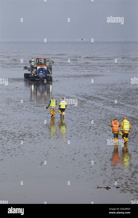 The Rnli Lifeboat Crew Launch Rescue Boat To Rescue Migrants In The