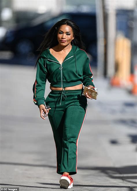 Angela Bassett 60 Is Gorgeous In Green Tracksuit And Coral Orange Sneakers Daily Mail Online