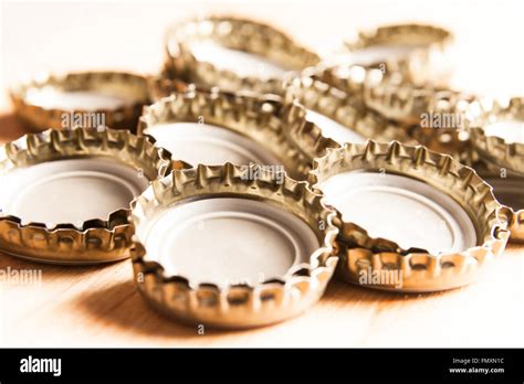 A Lot Of Crown Caps On The Brown Ground Stock Photo Alamy