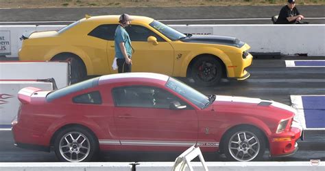 Watch A Dodge Demon Take On A Previous Gen Shelby Mustang GT500 In Drag