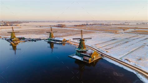 Drone View At The Zaanse Schans Windmill Village During Winter With