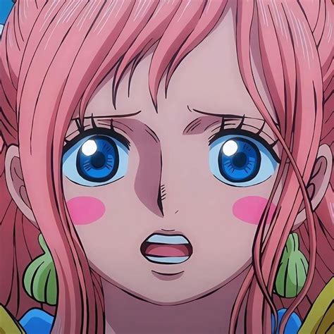 An Anime Character With Pink Hair And Blue Eyes