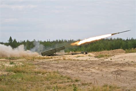 Self-propelled multiple rocket launcher system BM-27 Uragan, firing ...