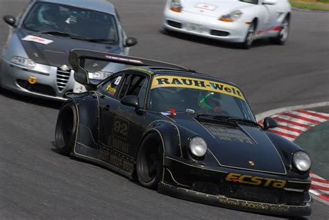 RWB Porsche 911 Rauh-Welt Begriff 964 on race track | Revival Sports ...