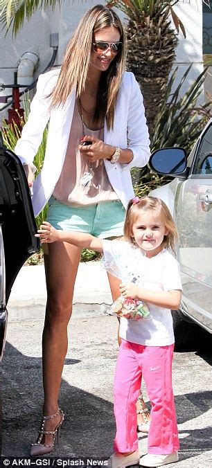 Alessandra Ambrosio Wriggles Into Tiny Aqua Shorts During Day Out With