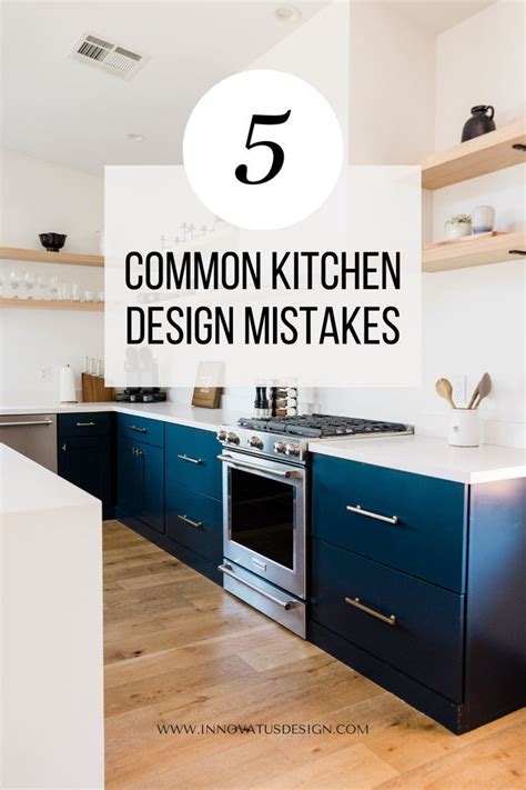 A Kitchen With Blue Cabinets And White Counter Tops That Says 5 Common